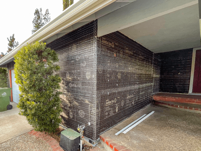 Cover stucco with siding